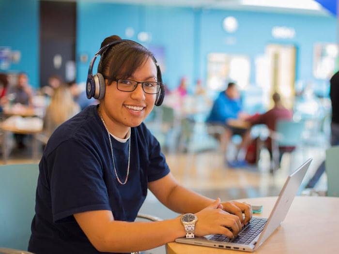 A student works on a laptop